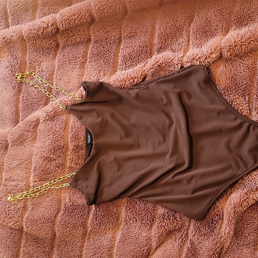 Body suit with chains